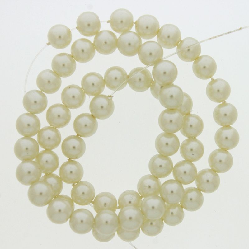 Perla cristal redonda Ø 7mm 2 agujeros. Color crema.