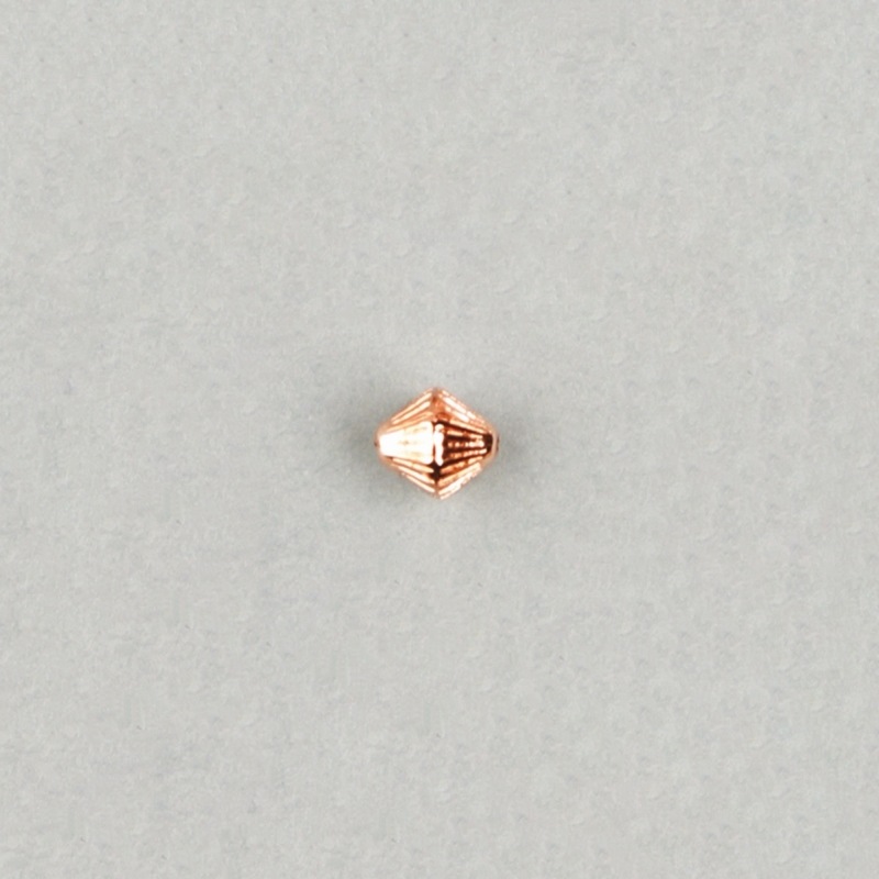 Metallize bead 6,5x7mm. Hole Ø 1mm
