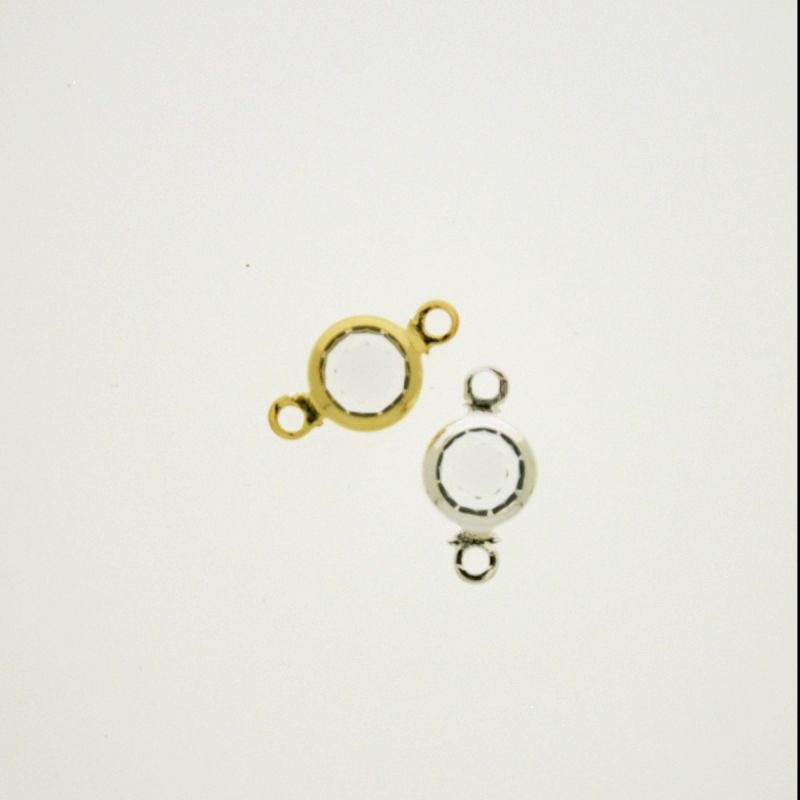 Entrepieza con strass redondo diam. 6mm color cristal. Longitud 13mm