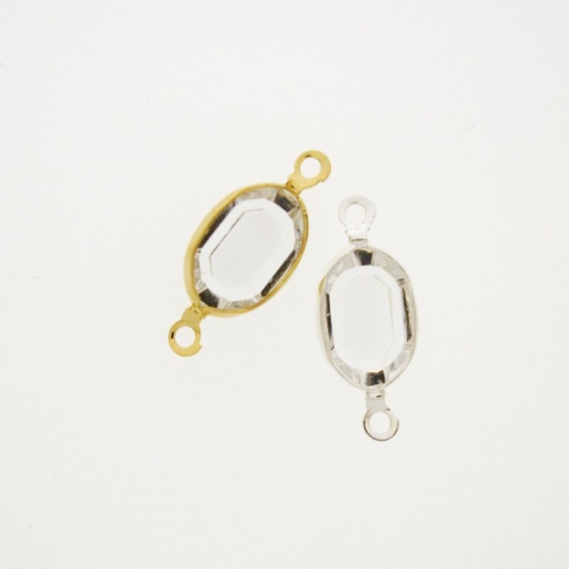 Entrepieza con strass ovalado 8x12mm color cristal. Longitud 21mm