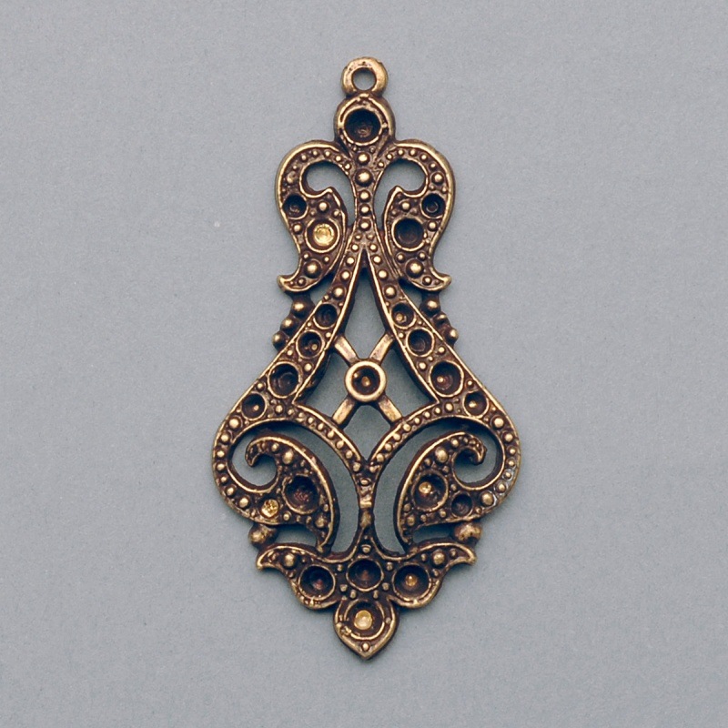 [112510000] Filigree finding 50x25mm with 21 sockets to strass