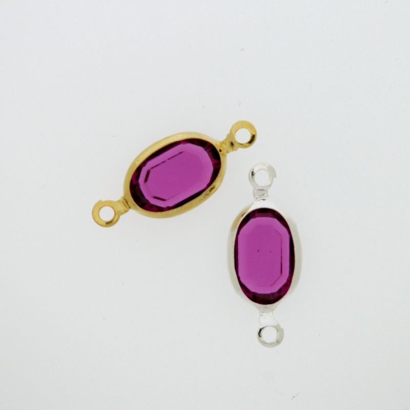 Intercalaire ovale 8x12mm couleur fuchsia. Longueur 21mm
