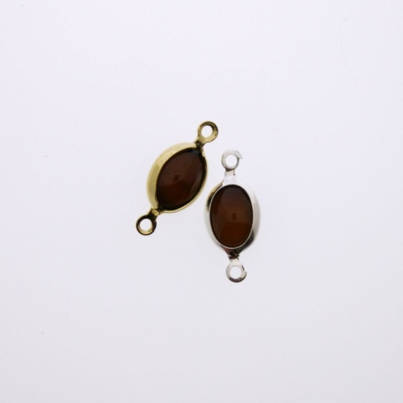Intercalaire ovale 6x8mm couleur de la coquille. Longueur 16mm