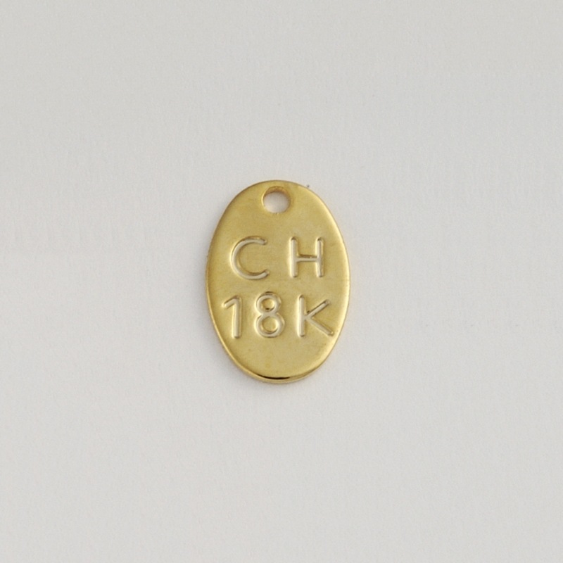 Placa con logo CH 18K" 10x7mm"