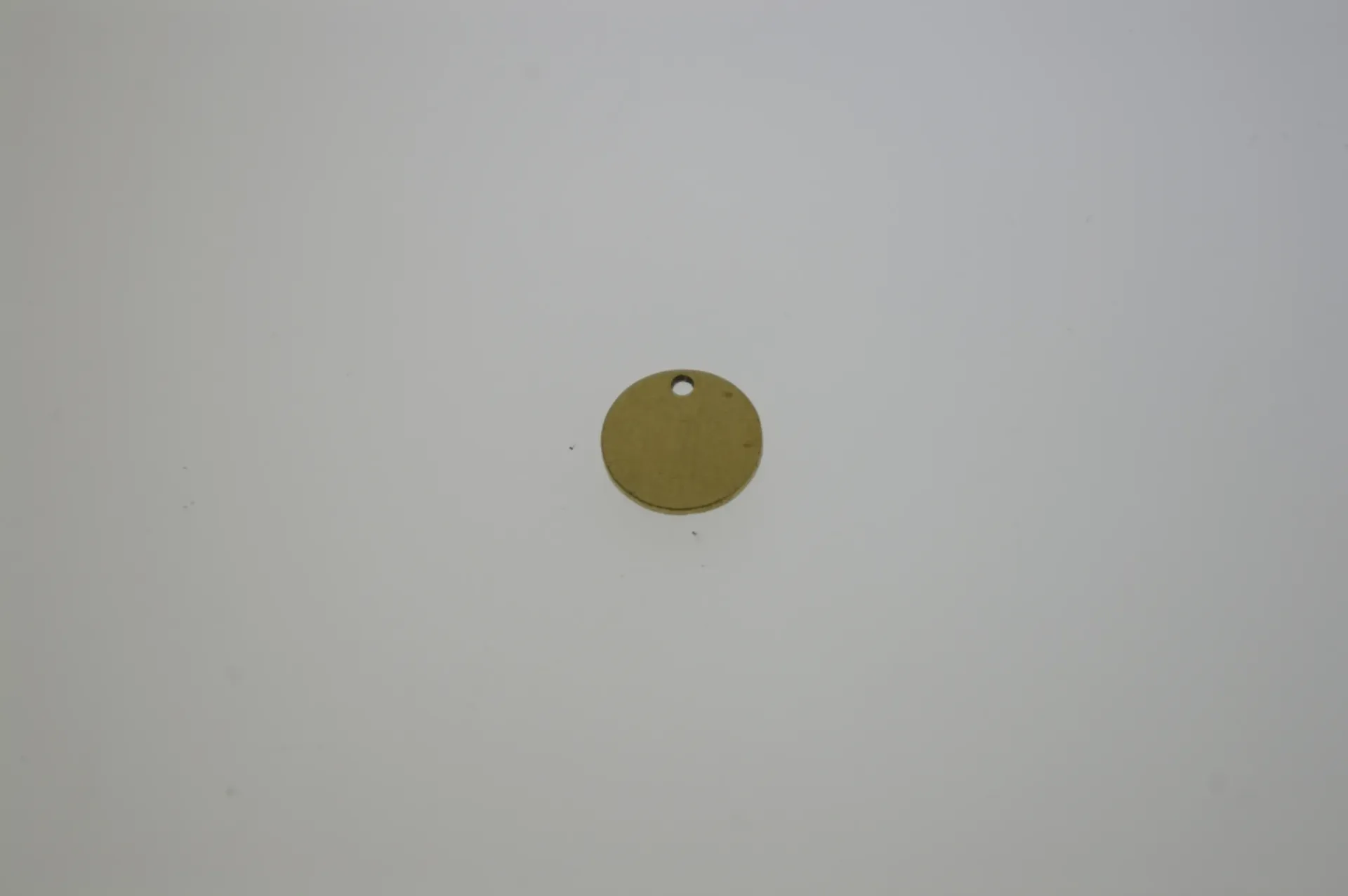 [129571000] Disque en laiton Ø 10mm avec trou