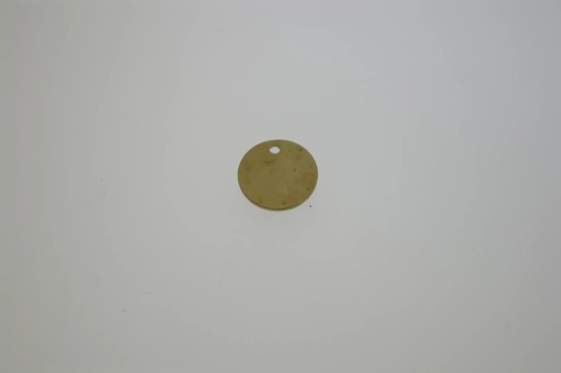 Disque en laiton Ø 12mm avec trou