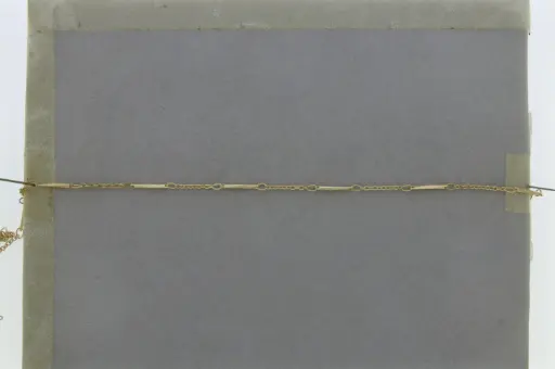 [525440000] Brass chain width 1,3mm. Length of the ornament: 12mm